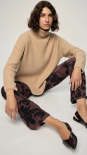 Load image into Gallery viewer, The Staple the Label Olina Mesh Pants feature the same moody floral print as the matching top, crafted in a sheer stretch mesh that moves with you. With a flattering flared leg and pull-on waistband, these pants bring serious 90s energy with a modern edge.
- Sheer mesh fabric with all-over black floral print
- Elastic waistband for comfort and ease
- Slim fit through the leg with a slight flare
