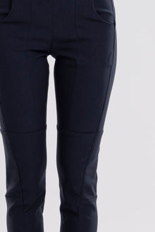 NES Section Pant is the perfect blend of style and comfort, featuring fabulous spliced detailing that adds a modern edge to your look. With a sleek flat front and an elasticated back, these pants offer a comfortable and flattering fit. Practical side pockets enhance the design, while the length finishes just above the ankle, creating a chic, tailored silhouette. Ideal for both casual and dressier occasions