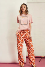 Load image into Gallery viewer, Embrace laid-back vibes with the We are the others, Lana Vintage Tee - Rose All Day. This relaxed-fit tee combines effortless style with a touch of sass, featuring a retro-inspired &quot;Rose All Day&quot; graphic. Crafted from a soft, breathable fabric, it’s perfect for sunny days, casual outings, or layering up for a cool, vintage look.
