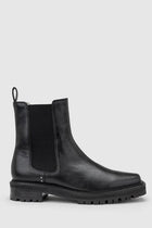 Chaos & Harmony OLLIE Boot, a blend of sustainable fashion and distinctive design. Crafted from black recycled leather, these boots are a testament to both style and environmental consciousness. The square toe shape sets a contemporary tone, offering a unique silhouette that stands out. Black recycled leather chelsea boot, Soft leather lined