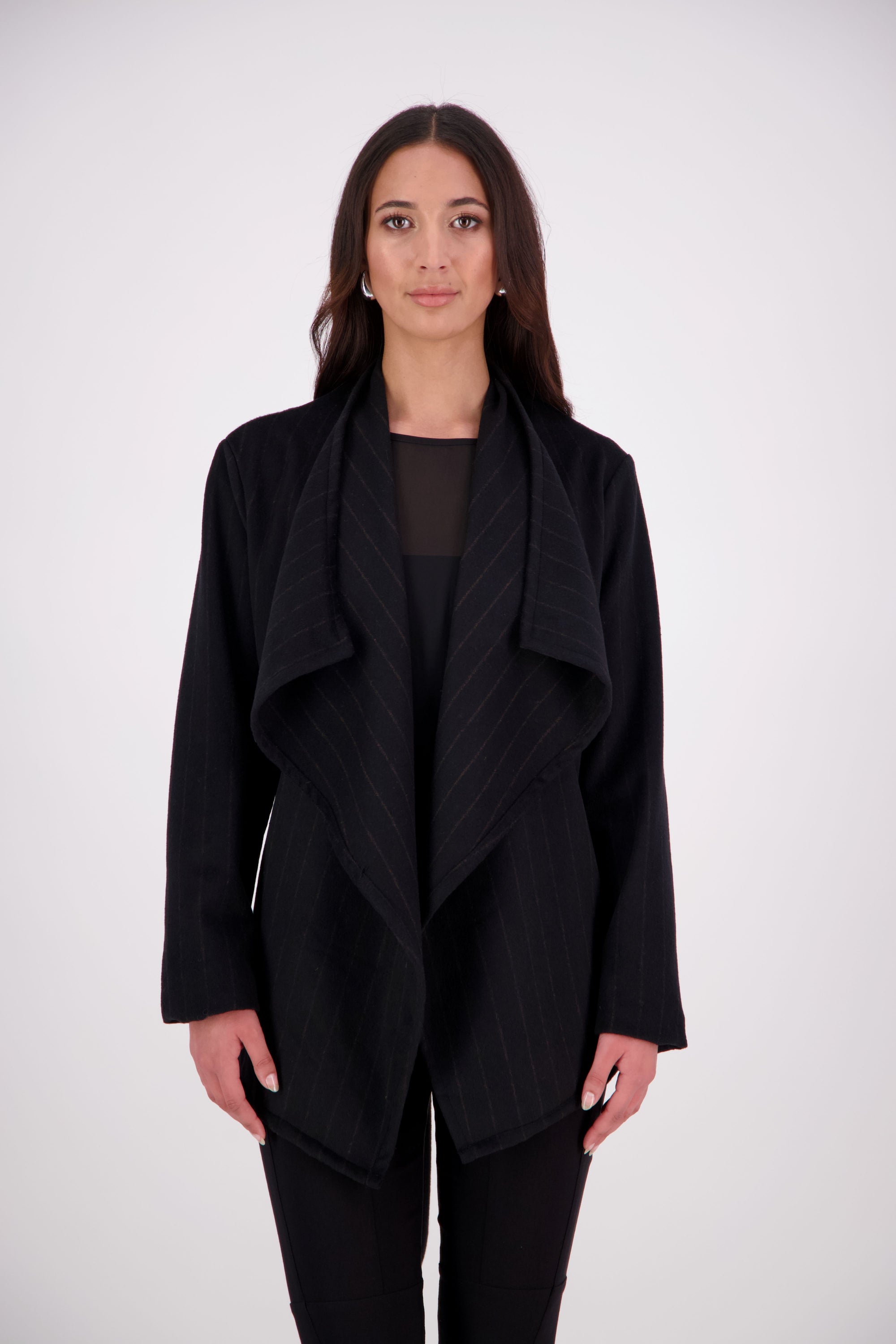 Our NES Ella jacket is a great winter jacket. It has a waterfall front detail.
Features lined sleeves - perfect to stop your knit jumpers from catching up and making the coat more comfortable to wear. A waist tie that you can wrap the coat around you or tie at the back of the coat.