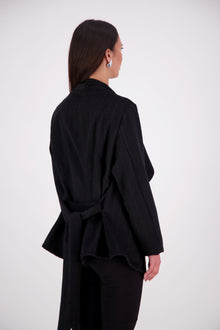 Our NES Ella jacket is a great winter jacket. It has a waterfall front detail.
Features lined sleeves - perfect to stop your knit jumpers from catching up and making the coat more comfortable to wear. A waist tie that you can wrap the coat around you or tie at the back of the coat.