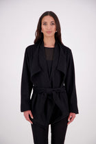 Our NES Ella jacket is a great winter jacket. It has a waterfall front detail.
Features lined sleeves - perfect to stop your knit jumpers from catching up and making the coat more comfortable to wear. A waist tie that you can wrap the coat around you or tie at the back of the coat.
