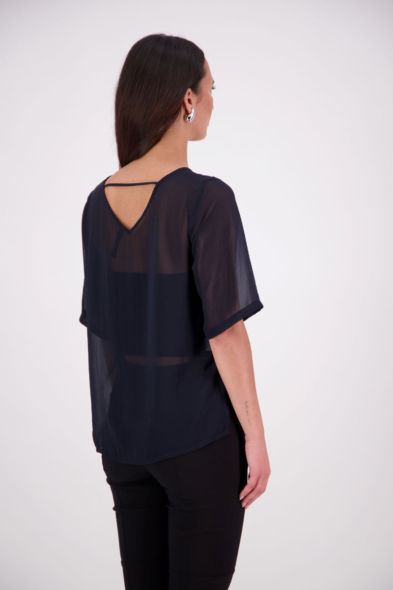 The Nes Zoe Top is a semi-sheer, stylish floaty relaxed t-shirt style top perfect for the warmer seasons. Wear The Zoe Top alone, or layer over dresses, or over your favourite bottoms.

Features: Curved front neckline and V back neck (can be reversed), even hem line, side splits

Composition: Poly Chiffon
