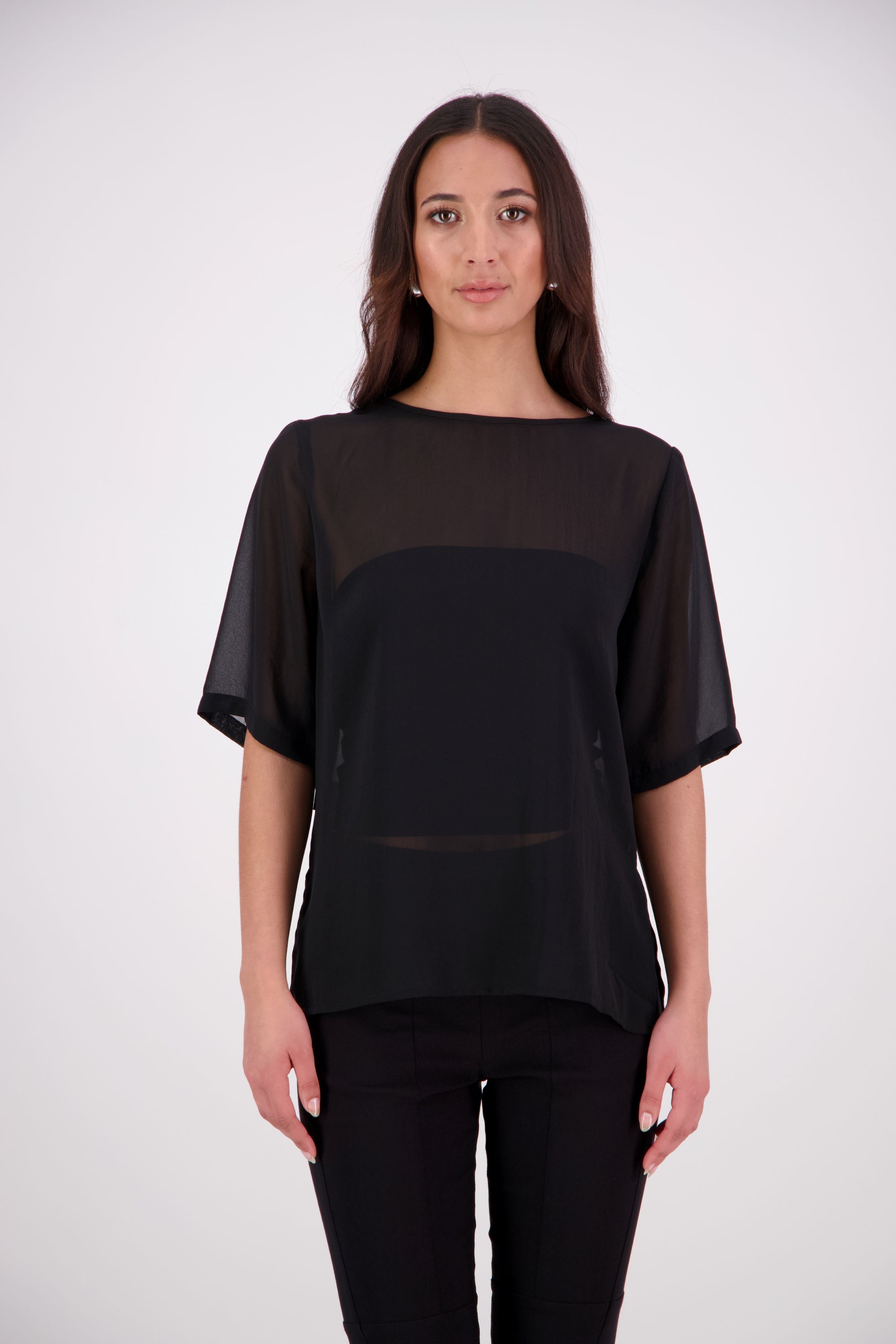 The Nes Zoe Top is a semi-sheer, stylish floaty relaxed t-shirt style top perfect for the warmer seasons. Wear The Zoe Top alone, or layer over dresses, or over your favourite bottoms.

Features: Curved front neckline and V back neck (can be reversed), even hem line, side splits

Composition: Poly Chiffon