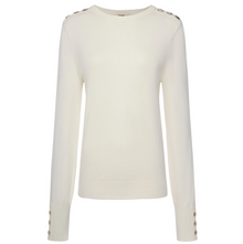 Nicki by Moke women’s fine gauge knit top in fresh 2026 tonal colours. Crafted from a soft 12 gauge yarn for a lightweight feel and smooth, polished drape, creating a flattering, best selling silhouette ideal for trans seasonal layering. Features statement gold button detailing at the sleeves and shoulders for a refined, elevated finish. An effortless everyday knit designed in New Zealand and loved season after season.