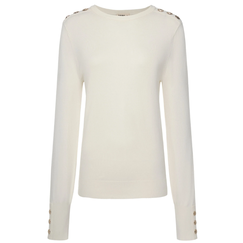 Nicki by Moke women’s fine gauge knit top in fresh 2026 tonal colours. Crafted from a soft 12 gauge yarn for a lightweight feel and smooth, polished drape, creating a flattering, best selling silhouette ideal for trans seasonal layering. Features statement gold button detailing at the sleeves and shoulders for a refined, elevated finish. An effortless everyday knit designed in New Zealand and loved season after season.