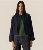 POL | SAGA JACKET : -Classic collar.
-3 button fastening, dyed to match.
-Full length sleeves.
-Two front patch pockets.
-Tonal topstitch details throughout.
-Boxy silhouette.
-Available in Butter, Blue and Ink.
-Style back with the Saga Pant in the matching colour.
-Marisa is 179cm tall and wearing a size 8 in the Ink. Valeria is 177cm tall and a 6-8 wearing a size 8 in the Butter and Blue.
-100% Linen.