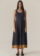 POL - SPECK CONTRAST DRESS
Featuring contrast hem detailing and a stunning silhouette, the Speck Contrast Dress can be easily dressed up or down.
-Invisible zip closure and hook and eye fastening at the centre back.
-Scooped neckline.
-Sleeveless design.
-Panelled design creates tapered waist for a body skimming silhouette, that flares out over the hips into a full skirt.
-Contrast panel at the hem.