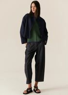 POL | SAGA JACKET : -Classic collar.
-3 button fastening, dyed to match.
-Full length sleeves.
-Two front patch pockets.
-Tonal topstitch details throughout.
-Boxy silhouette.
-Available in Butter, Blue and Ink.
-Style back with the Saga Pant in the matching colour.
-Marisa is 179cm tall and wearing a size 8 in the Ink. Valeria is 177cm tall and a 6-8 wearing a size 8 in the Butter and Blue.
-100% Linen.