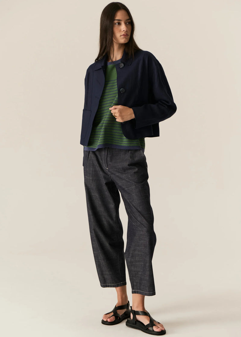 POL | SAGA JACKET : -Classic collar.
-3 button fastening, dyed to match.
-Full length sleeves.
-Two front patch pockets.
-Tonal topstitch details throughout.
-Boxy silhouette.
-Available in Butter, Blue and Ink.
-Style back with the Saga Pant in the matching colour.
-Marisa is 179cm tall and wearing a size 8 in the Ink. Valeria is 177cm tall and a 6-8 wearing a size 8 in the Butter and Blue.
-100% Linen.