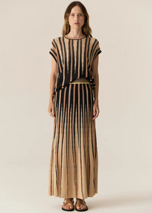  POL - TEDD KNIT SKIRT
The Tedd Knit Skirt combines our signature knitted pleat detailing with pointelle stitch, and a stunning intarsia pattern in three key colourways.
-Striped elasticised waistband - pull on style.-Half lining.-Spiked intarsia detailing from the hem up.-Vertical two tone stripe detailing separates pointelle stitch and jersey intarsia knit panels to create a multi-textured look you won't find anywhere else.-Midi length, a-line 