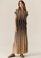  POL - TEDD KNIT SKIRT
The Tedd Knit Skirt combines our signature knitted pleat detailing with pointelle stitch, and a stunning intarsia pattern in three key colourways.
-Striped elasticised waistband - pull on style.-Half lining.-Spiked intarsia detailing from the hem up.-Vertical two tone stripe detailing separates pointelle stitch and jersey intarsia knit panels to create a multi-textured look you won't find anywhere else.-Midi length, a-line 
