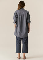 POL CASSIS FISH SHIRT
-Classic shirt collar.
-Button closure through the centre front.
-Gathered detail from yoke at the centre back.
-In-house designed placement fish print on either side at the front.
-Full length sleeves.
-Gathers at the cuffs - two button closure.
-Oversized fit through the body - longline silhouette.
-Hem curves down at the centre back.
-A-line shape.
-Available in Denim/Pebble and Natural/Berry.
100% COTTON