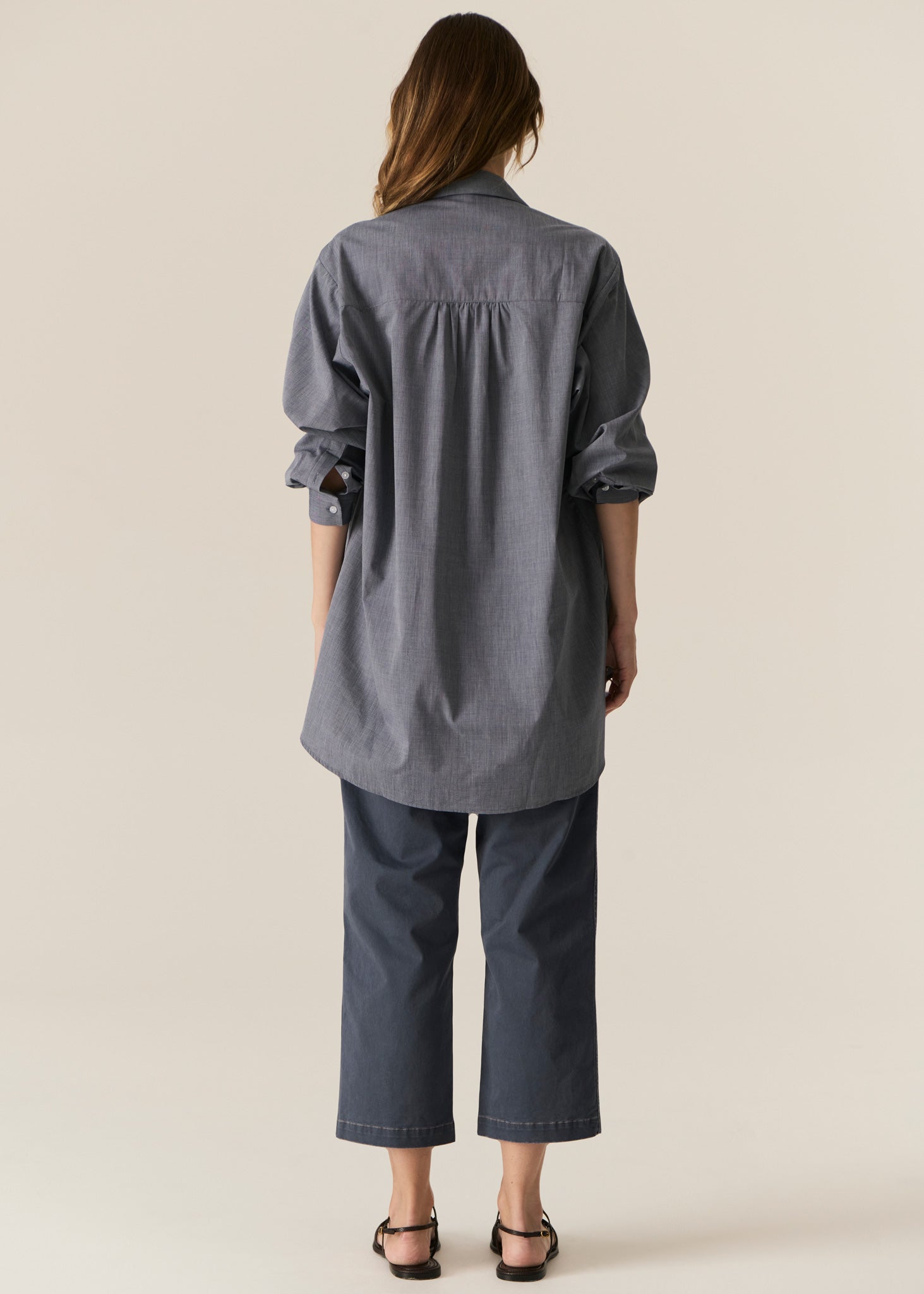 POL CASSIS FISH SHIRT
-Classic shirt collar.
-Button closure through the centre front.
-Gathered detail from yoke at the centre back.
-In-house designed placement fish print on either side at the front.
-Full length sleeves.
-Gathers at the cuffs - two button closure.
-Oversized fit through the body - longline silhouette.
-Hem curves down at the centre back.
-A-line shape.
-Available in Denim/Pebble and Natural/Berry.
100% COTTON