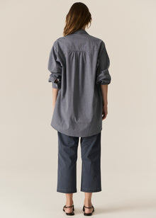 POL CASSIS FISH SHIRT
-Classic shirt collar.
-Button closure through the centre front.
-Gathered detail from yoke at the centre back.
-In-house designed placement fish print on either side at the front.
-Full length sleeves.
-Gathers at the cuffs - two button closure.
-Oversized fit through the body - longline silhouette.
-Hem curves down at the centre back.
-A-line shape.
-Available in Denim/Pebble and Natural/Berry.
100% COTTON