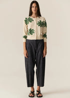 POL | LASK DAISY CARDI
-Round, ribbed neckline.
-Matching button closure through the centre front.
-Soft lightweight cotton yarn - perfect for layering in Spring.
-Intarsia Daisy detail - petals in cotton, centre in lurex yarn.
-Full length sleeves - deep ribbed cuffs.
-Regular fit through the body.
-Deep ribbed hem.
-Marisa is 179cm tall and a size 8, wearing a size S in all colours.
-Approximate length in cm by size: XS/52cm, S/53cm, M/54cm, L/55cm, XL/56cm.
-97% Cotton / 3% Metallic.