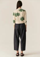 POL | LASK DAISY CARDI
-Round, ribbed neckline.
-Matching button closure through the centre front.
-Soft lightweight cotton yarn - perfect for layering in Spring.
-Intarsia Daisy detail - petals in cotton, centre in lurex yarn.
-Full length sleeves - deep ribbed cuffs.
-Regular fit through the body.
-Deep ribbed hem.
-Marisa is 179cm tall and a size 8, wearing a size S in all colours.
-Approximate length in cm by size: XS/52cm, S/53cm, M/54cm, L/55cm, XL/56cm.
-97% Cotton / 3% Metallic.