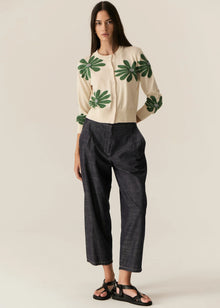 POL | LASK DAISY CARDI
-Round, ribbed neckline.
-Matching button closure through the centre front.
-Soft lightweight cotton yarn - perfect for layering in Spring.
-Intarsia Daisy detail - petals in cotton, centre in lurex yarn.
-Full length sleeves - deep ribbed cuffs.
-Regular fit through the body.
-Deep ribbed hem.
-Marisa is 179cm tall and a size 8, wearing a size S in all colours.
-Approximate length in cm by size: XS/52cm, S/53cm, M/54cm, L/55cm, XL/56cm.
-97% Cotton / 3% Metallic.