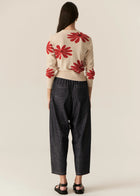 POL | LASK DAISY CARDI
-Round, ribbed neckline.
-Matching button closure through the centre front.
-Soft lightweight cotton yarn - perfect for layering in Spring.
-Intarsia Daisy detail - petals in cotton, centre in lurex yarn.
-Full length sleeves - deep ribbed cuffs.
-Regular fit through the body.
-Deep ribbed hem.
-Marisa is 179cm tall and a size 8, wearing a size S in all colours.
-Approximate length in cm by size: XS/52cm, S/53cm, M/54cm, L/55cm, XL/56cm.
-97% Cotton / 3% Metallic.