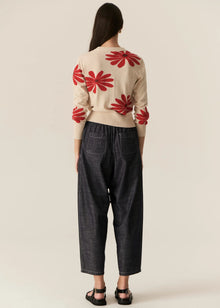 POL | LASK DAISY CARDI
-Round, ribbed neckline.
-Matching button closure through the centre front.
-Soft lightweight cotton yarn - perfect for layering in Spring.
-Intarsia Daisy detail - petals in cotton, centre in lurex yarn.
-Full length sleeves - deep ribbed cuffs.
-Regular fit through the body.
-Deep ribbed hem.
-Marisa is 179cm tall and a size 8, wearing a size S in all colours.
-Approximate length in cm by size: XS/52cm, S/53cm, M/54cm, L/55cm, XL/56cm.
-97% Cotton / 3% Metallic.