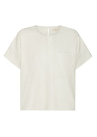 Featuring a soft faux leather in a fresh Ecru shade, the POL Belmond Top has a boxy, t-shirt inspired silhouette.

-Round neckline.
-Covered button fastening at the back neck.
-Dropped armholes.
-Short sleeves finish in a cuff with covered button fastening.