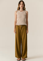 POL -  LUCA TANK
Made from a ribbed viscose and cotton blend yarn, the Luca Knit Tank is super soft and wearable for Spring.
-Round neckline - ribbed with contrast striped edge.
-Sleeveless design - armholes are ribbed with contrast striped edge.
-Body skimming fit - ribbed style has a nice amount of stretch.
-Available in White/Camel and White/Ink