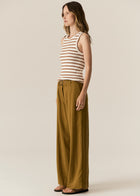 POL -  LUCA TANK
Made from a ribbed viscose and cotton blend yarn, the Luca Knit Tank is super soft and wearable for Spring.
-Round neckline - ribbed with contrast striped edge.
-Sleeveless design - armholes are ribbed with contrast striped edge.
-Body skimming fit - ribbed style has a nice amount of stretch.
-Available in White/Camel and White/Ink