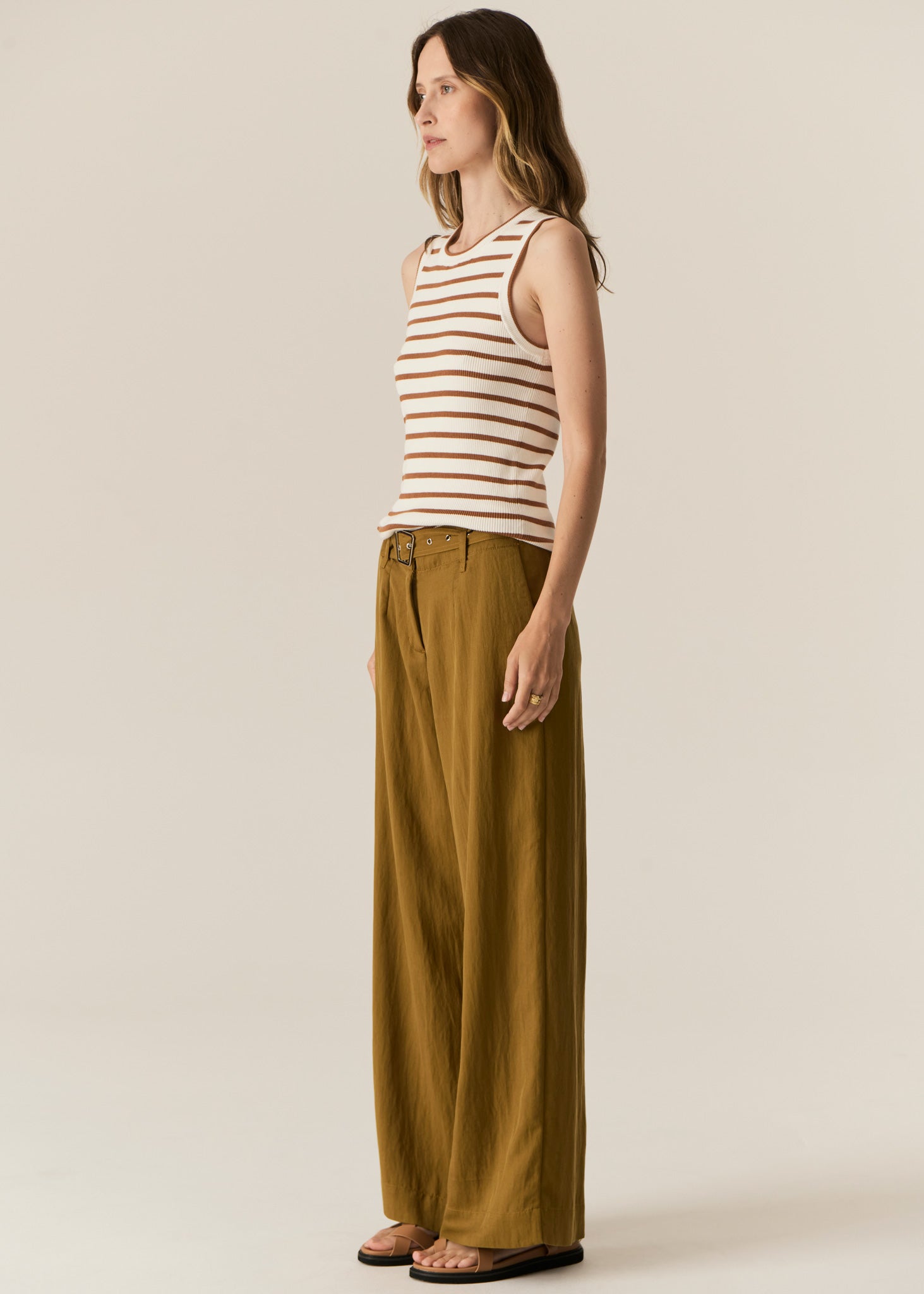 POL -  LUCA TANK
Made from a ribbed viscose and cotton blend yarn, the Luca Knit Tank is super soft and wearable for Spring.
-Round neckline - ribbed with contrast striped edge.
-Sleeveless design - armholes are ribbed with contrast striped edge.
-Body skimming fit - ribbed style has a nice amount of stretch.
-Available in White/Camel and White/Ink
