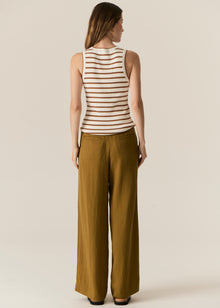 POL -  LUCA TANK
Made from a ribbed viscose and cotton blend yarn, the Luca Knit Tank is super soft and wearable for Spring.
-Round neckline - ribbed with contrast striped edge.
-Sleeveless design - armholes are ribbed with contrast striped edge.
-Body skimming fit - ribbed style has a nice amount of stretch.
-Available in White/Camel and White/Ink