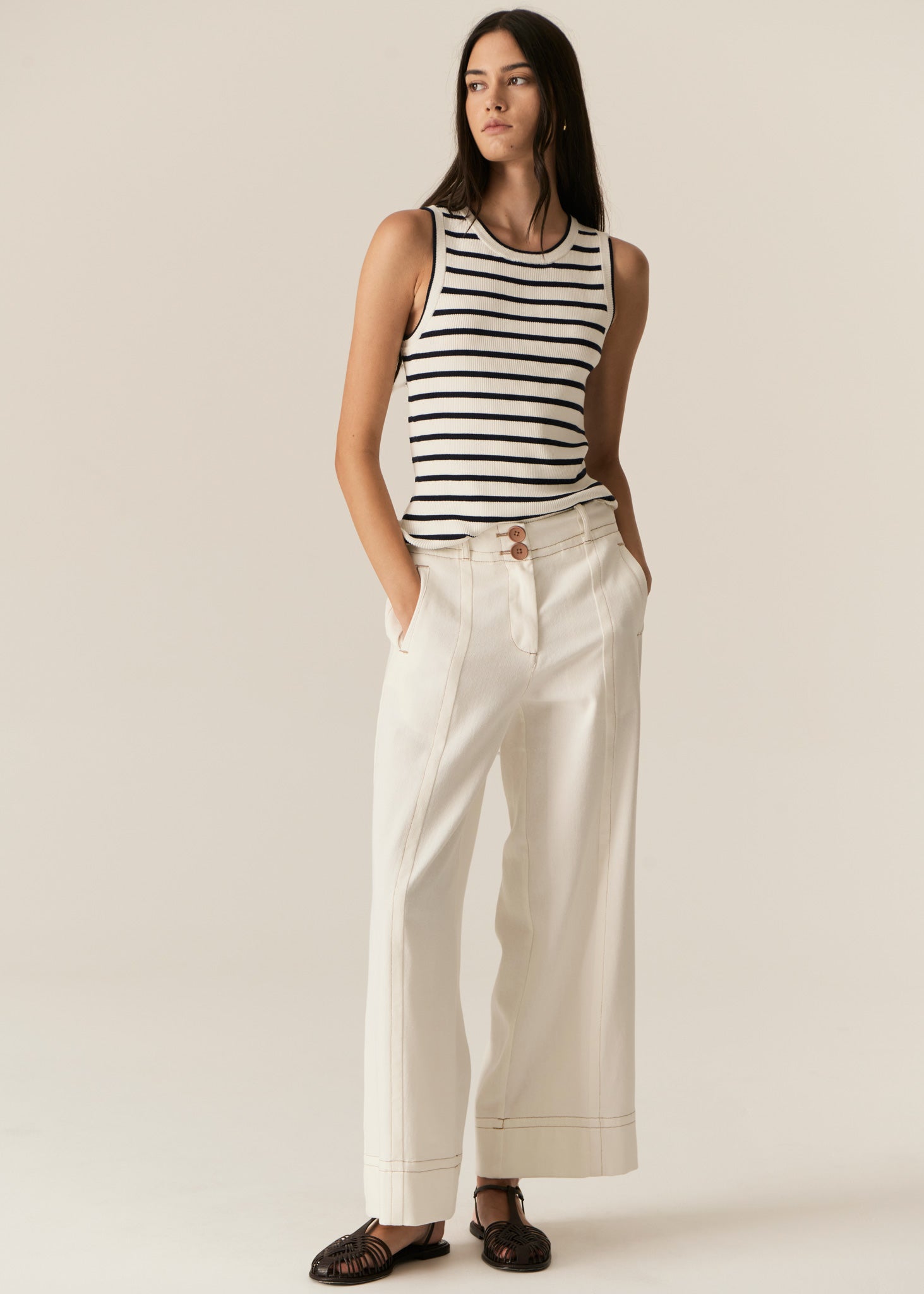 POL -  LUCA TANK
Made from a ribbed viscose and cotton blend yarn, the Luca Knit Tank is super soft and wearable for Spring.
-Round neckline - ribbed with contrast striped edge.
-Sleeveless design - armholes are ribbed with contrast striped edge.
-Body skimming fit - ribbed style has a nice amount of stretch.
-Available in White/Camel and White/Ink