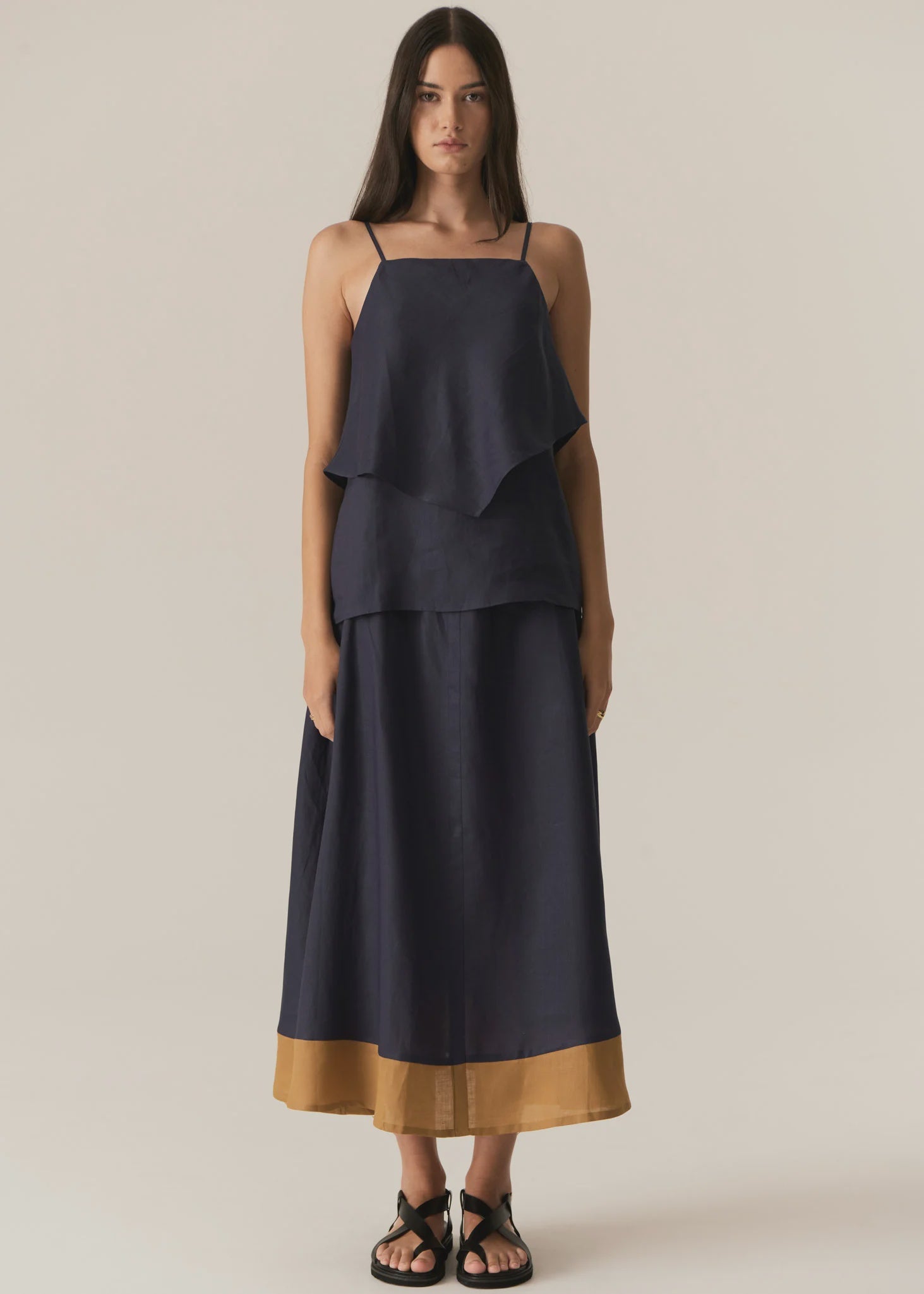 POL SPECK DOUBLE LAYER CAMI
The Speck Double Layer Cami brings back one of our favourite silhouettes in solid colours for the new season.
-Square neckline.
-Adjustable thin straps.
-Pull on style.
-Regular fit.
-Angled overlayer creates a handkerchief look.
-Straight underlayer can be tucked in or worn untucked.