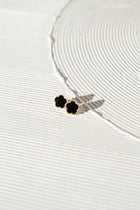 CASTEL & CO | POPPY STUD
Fresh, feminine, and effortlessly cool. The Poppy Studs in white bring a soft pop of polish to your everyday look. Crafted from gold-plated stainless steel, they’re waterproof, hypoallergenic, and gentle on the ears. With a classic stud closure and delicate floral shape, they’re made to be worn on their own – simple, elegant, and easy to love.

Main material: gold plating, stainless steel
Closure type: stud
Earrings size: 1,3 х 1,3 cm
Waterproof and hypoallergenic
Weight: 2g