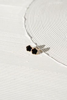 CASTEL & CO | POPPY STUD
Fresh, feminine, and effortlessly cool. The Poppy Studs in white bring a soft pop of polish to your everyday look. Crafted from gold-plated stainless steel, they’re waterproof, hypoallergenic, and gentle on the ears. With a classic stud closure and delicate floral shape, they’re made to be worn on their own – simple, elegant, and easy to love.

Main material: gold plating, stainless steel
Closure type: stud
Earrings size: 1,3 х 1,3 cm
Waterproof and hypoallergenic
Weight: 2g