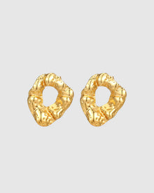 Modern and sculptural, the Castel & Co Remi Earrings in polished silver feature an open, organic form with a textured finish. Their irregular shape adds depth and edge, while the cool silver tone brings a sleek, contemporary feel. A striking statement stud that balances artistry with everyday versatility.

Material: Stainless steel
Closure Type: Stud
Earring Size: 3 x 2.4 cm
Waterproof and hypoallergenic
Weight: 8g