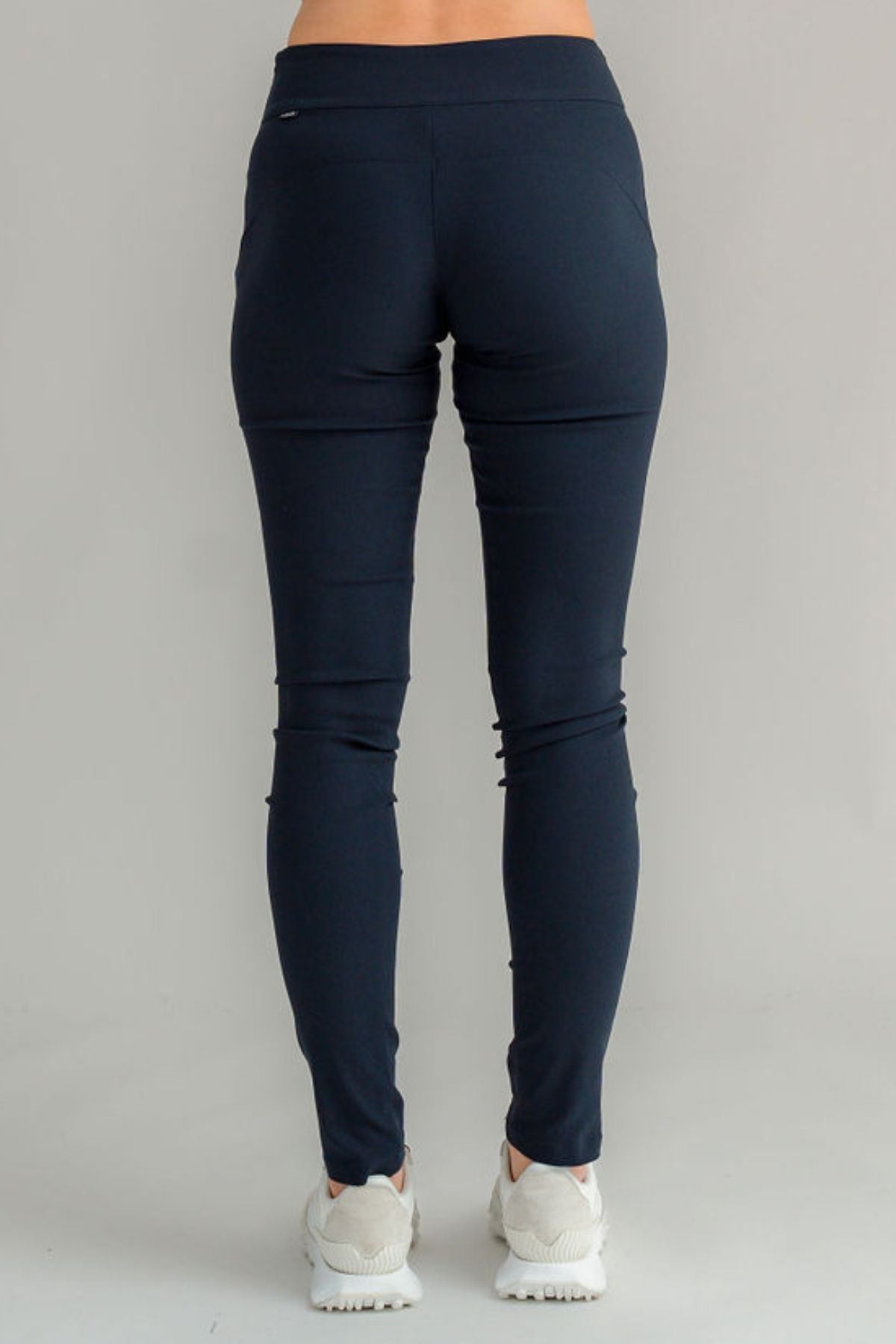 The NES Skinnie Minnies Pant is your go-to for sleek, everyday style with a modern edge. Crafted from the same super stretchy twill fabric you love, these pants are all about a flattering fit and effortless comfort. Featuring a cigarette-style slim leg, flat waistband, and a concealed side seam zip, the Skinnie Minnies offer a streamlined silhouette that's both polished and wearable.