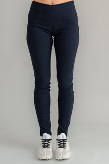 The NES Skinnie Minnies Pant is your go-to for sleek, everyday style with a modern edge. Crafted from the same super stretchy twill fabric you love, these pants are all about a flattering fit and effortless comfort. Featuring a cigarette-style slim leg, flat waistband, and a concealed side seam zip, the Skinnie Minnies offer a streamlined silhouette that's both polished and wearable.
