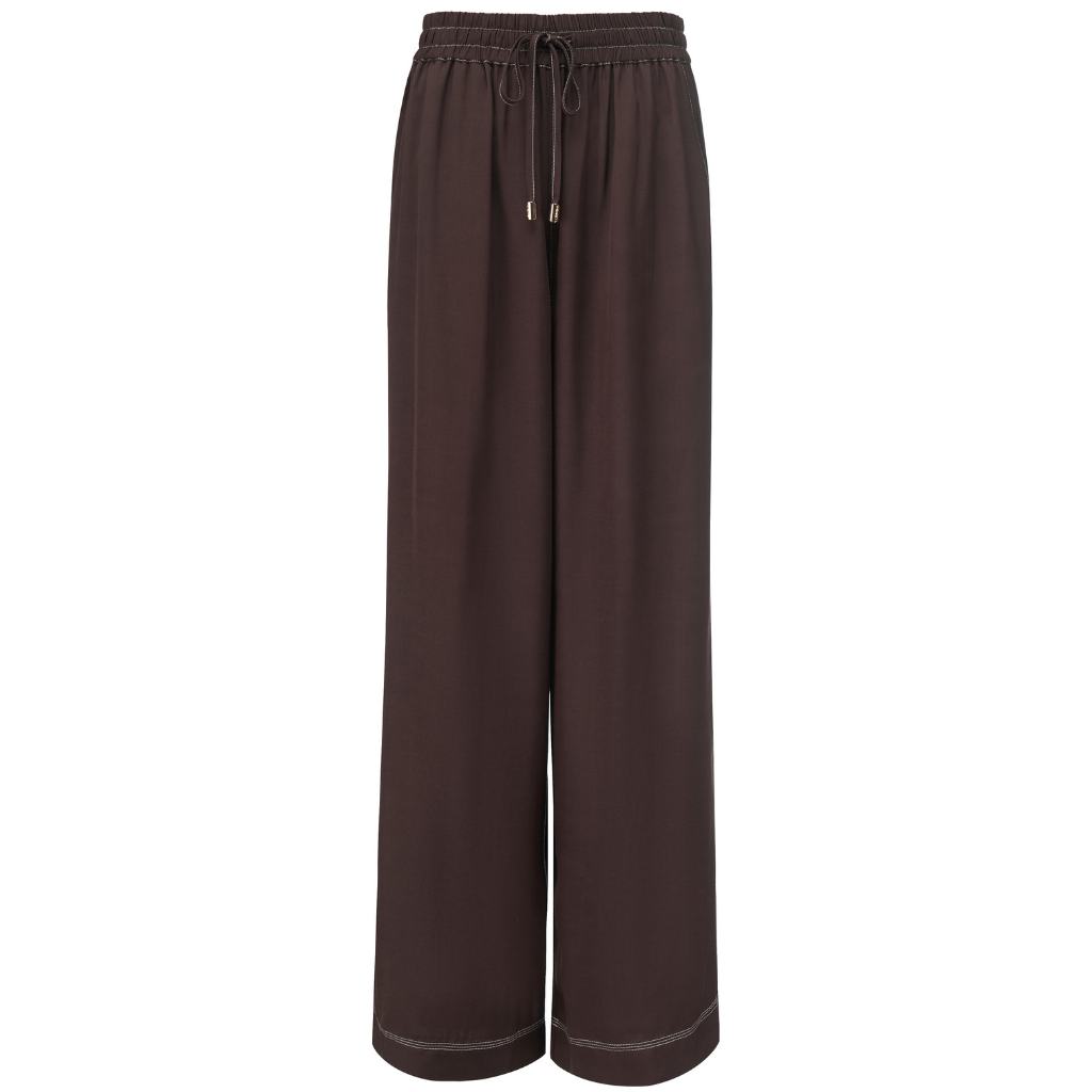 BOWIE PANT BY MOKE
Elevate your casual wardrobe with these floaty, wide-leg pull-on pants, designed for ultimate comfort and style. Crafted from a luxurious blend of butter-soft viscose, Tencel, rayon and linen, these pants offer a silky-smooth feel against the skin, while their breezy, relaxed fit provides all-day ease.