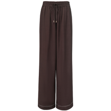 BOWIE PANT BY MOKE
Elevate your casual wardrobe with these floaty, wide-leg pull-on pants, designed for ultimate comfort and style. Crafted from a luxurious blend of butter-soft viscose, Tencel, rayon and linen, these pants offer a silky-smooth feel against the skin, while their breezy, relaxed fit provides all-day ease.