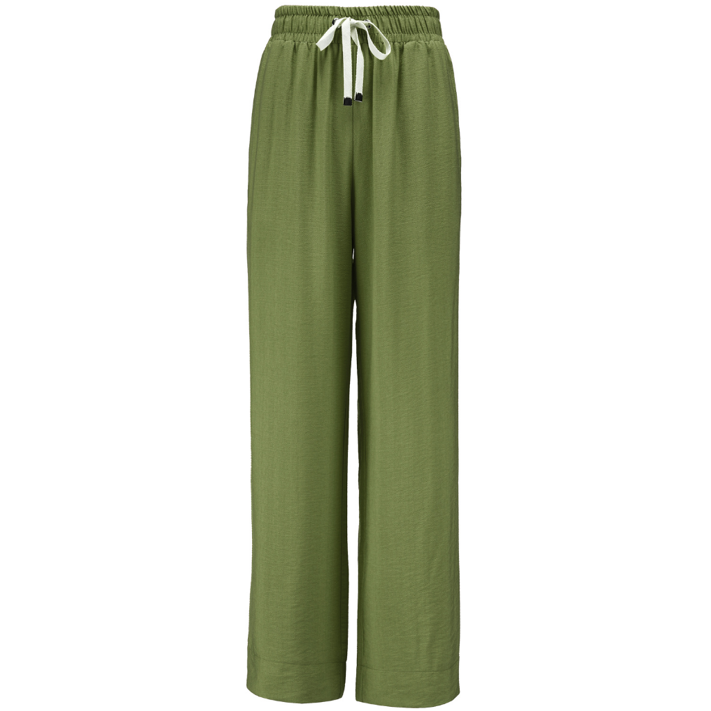 INDIANA BY MOKE
The Indiana Pants are back - and it’s no surprise they’re a top seller. Cut from a breathable viscose-nylon blend, these wide-leg pants are designed for comfort, polish, and all-day wear.
Cream contrast stripes run down each leg for a sport-luxe edge, while subtle side splits at the hem add movement and a touch of ease. The fit is streamlined yet relaxed, with a wide-leg silhouette that flatters every shape and pairs beautifully with tanks, tees, or a crisp shirt.