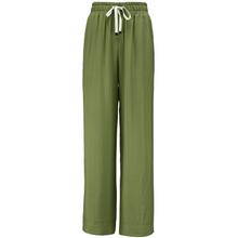 INDIANA BY MOKE
The Indiana Pants are back - and it’s no surprise they’re a top seller. Cut from a breathable viscose-nylon blend, these wide-leg pants are designed for comfort, polish, and all-day wear.
Cream contrast stripes run down each leg for a sport-luxe edge, while subtle side splits at the hem add movement and a touch of ease. The fit is streamlined yet relaxed, with a wide-leg silhouette that flatters every shape and pairs beautifully with tanks, tees, or a crisp shirt.