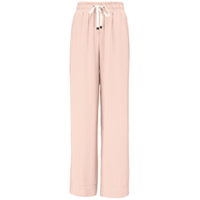 INDIANA BY MOKE
The Indiana Pants are back - and it’s no surprise they’re a top seller. Cut from a breathable viscose-nylon blend, these wide-leg pants are designed for comfort, polish, and all-day wear.
Cream contrast stripes run down each leg for a sport-luxe edge, while subtle side splits at the hem add movement and a touch of ease. The fit is streamlined yet relaxed, with a wide-leg silhouette that flatters every shape and pairs beautifully with tanks, tees, or a crisp shirt.