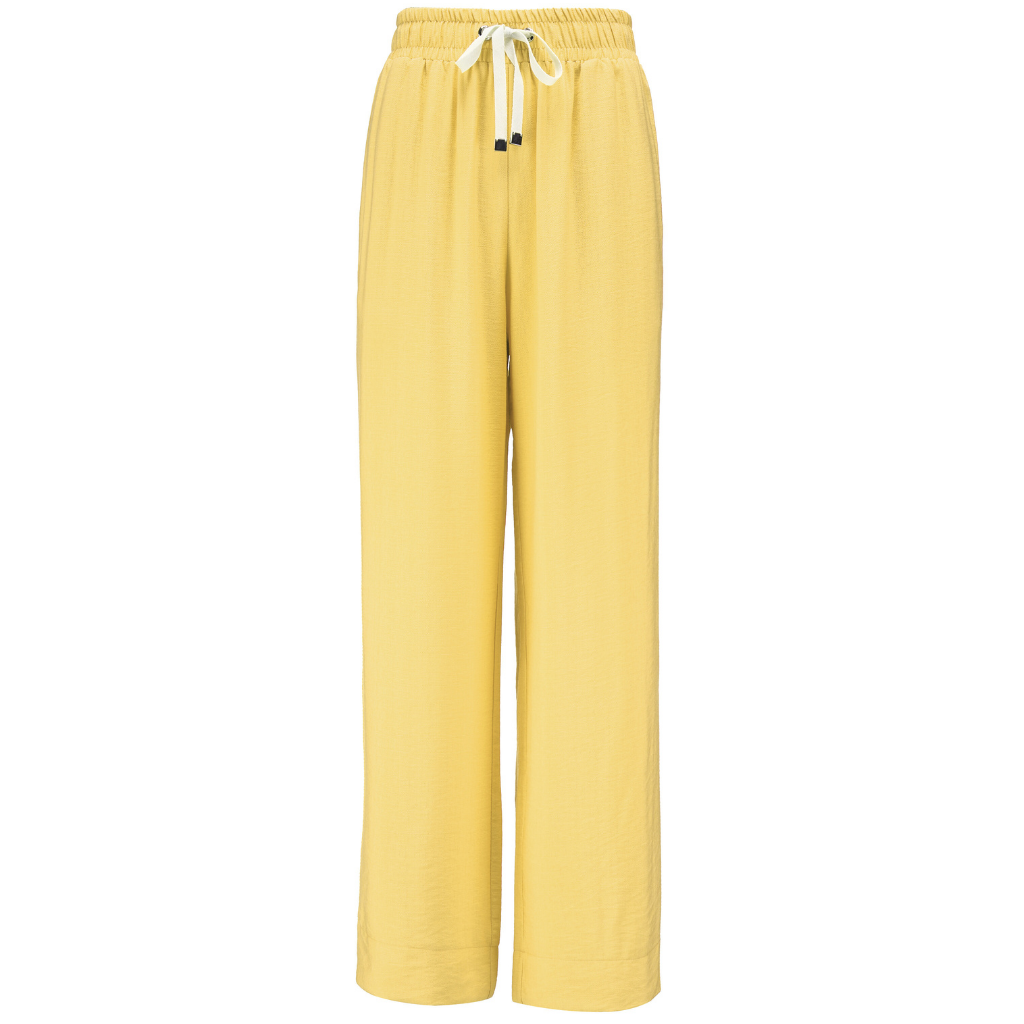 INDIANA BY MOKE
The Indiana Pants are back - and it’s no surprise they’re a top seller. Cut from a breathable viscose-nylon blend, these wide-leg pants are designed for comfort, polish, and all-day wear.
Cream contrast stripes run down each leg for a sport-luxe edge, while subtle side splits at the hem add movement and a touch of ease. The fit is streamlined yet relaxed, with a wide-leg silhouette that flatters every shape and pairs beautifully with tanks, tees, or a crisp shirt.