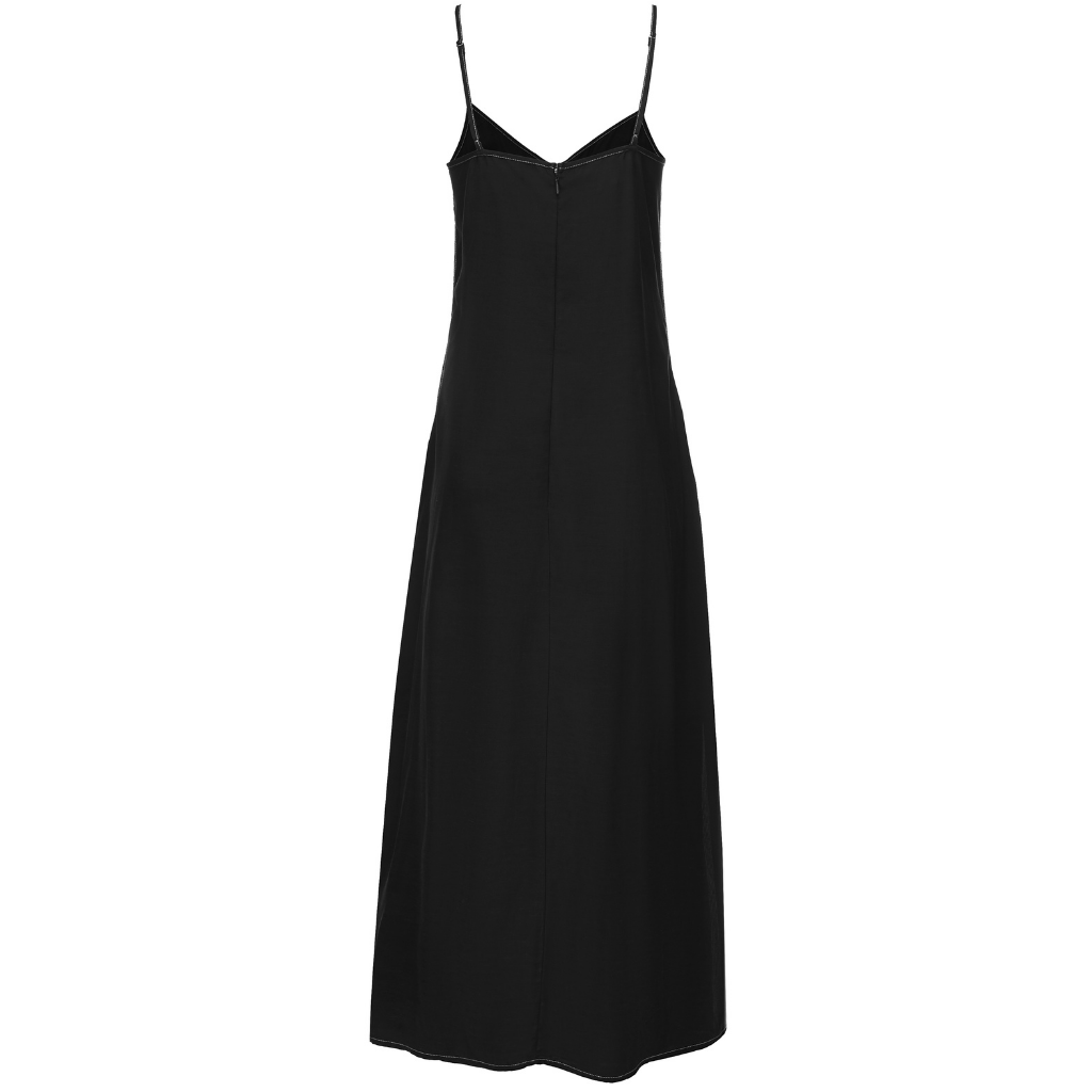 LYDIA SLIP DRESS BY MOKE
Meet the LYDIA Slip Dress – a timeless piece that embodies effortless elegance. Crafted from a viscose tencel blend, this dress is your go-to for chic, warm-weather dressing. With its delicate, adjustable straps and flattering side slits, the LYDIA Slip Dress is designed to be as versatile as it is beautiful.