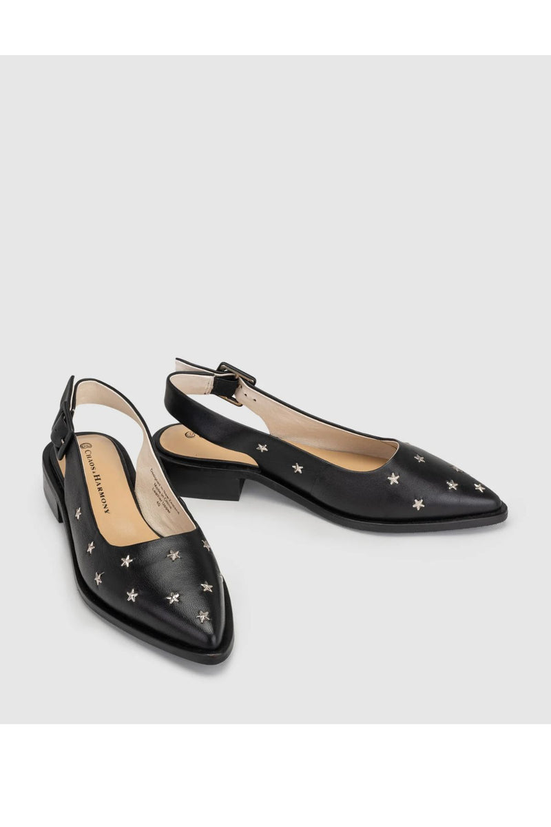 Chaos & Harmony Starburst Flat in black leather with silver star studs and supportive back strap, soft leather lining, low block heel and rubber outsole, statement women’s flat shoe