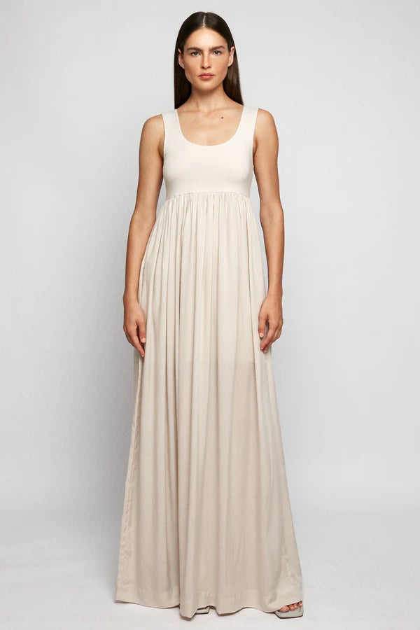 SWF Wide Singlet Dress. This sleeveless sundress features a scoop neckline and a flowing, gathered skirt.
95% Viscose 5% Spandex