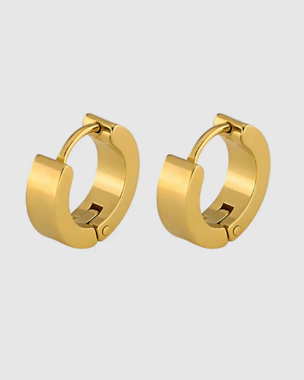 A modern take on the everyday hoop, the Castel & Co Sadie earrings feature a smaller, thicker silhouette that adds just the right amount of boldness. Available in both gold and silver, their clean, polished finish makes them an effortless staple for daily wear.

Material: Stainless steel &amp; Gold Plated
Closure Type: Congo
Earrings Size: 1.3 х 1.2 cm
Waterproof and hypoallergenic
Weight: 3g