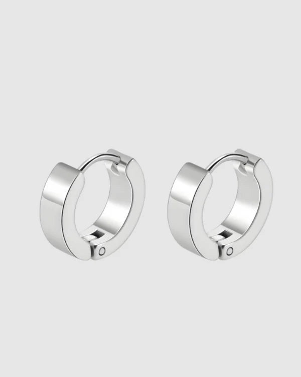 A modern take on the everyday hoop, the Castel & Co Sadie earrings feature a smaller, thicker silhouette that adds just the right amount of boldness. Available in both gold and silver, their clean, polished finish makes them an effortless staple for daily wear.

Material: Stainless steel &amp; Gold Plated
Closure Type: Congo
Earrings Size: 1.3 х 1.2 cm
Waterproof and hypoallergenic
Weight: 3g