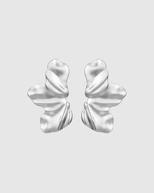 Sculptural and dramatic, the Castel & Co Sienna Earrings feature fluid, folded curves in radiant gold plating. Their bold silhouette and organic form create a striking sense of movement, designed to frame the face with modern artistry. A statement earring that embodies elegance with an edge.

Material: Stainless steel, Gold plating
Closure Type: Stud
Earrings Size: 4.5 x 2.5 cm
Waterproof and hypoallergenic
Weight: 7g