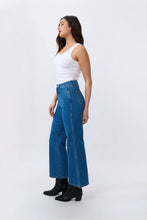 Load image into Gallery viewer, Kireina&#39;s gone with classic 5-pocket jeans style with the Skylar Wide Leg jean. With a soft denim in new 90s Blue this flattering jean delivers rock’n’roll style for everyday.

FEATURES:
- High Rise Wide Leg
- Average Inside Leg Length = 75cm
- 5-pocket Style
- Zipper fly
